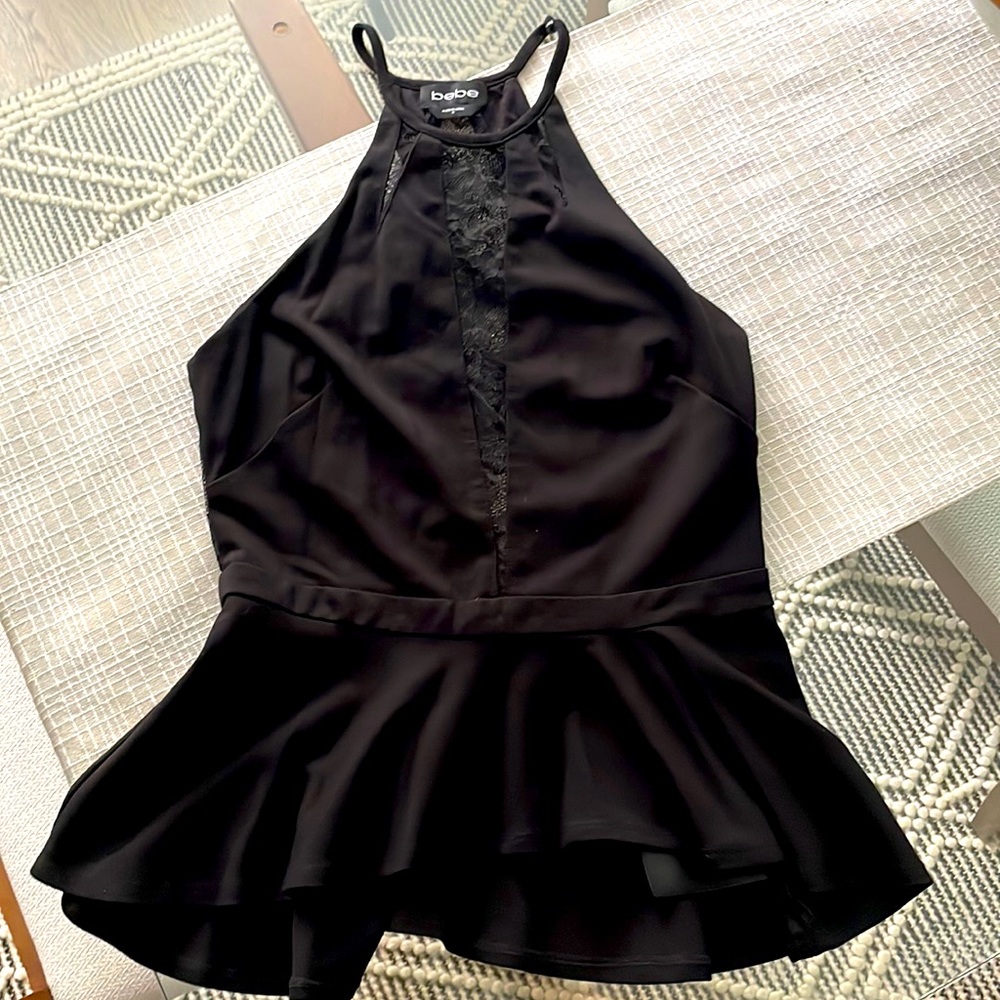 Bebe Peplum Top with Lace Cutouts